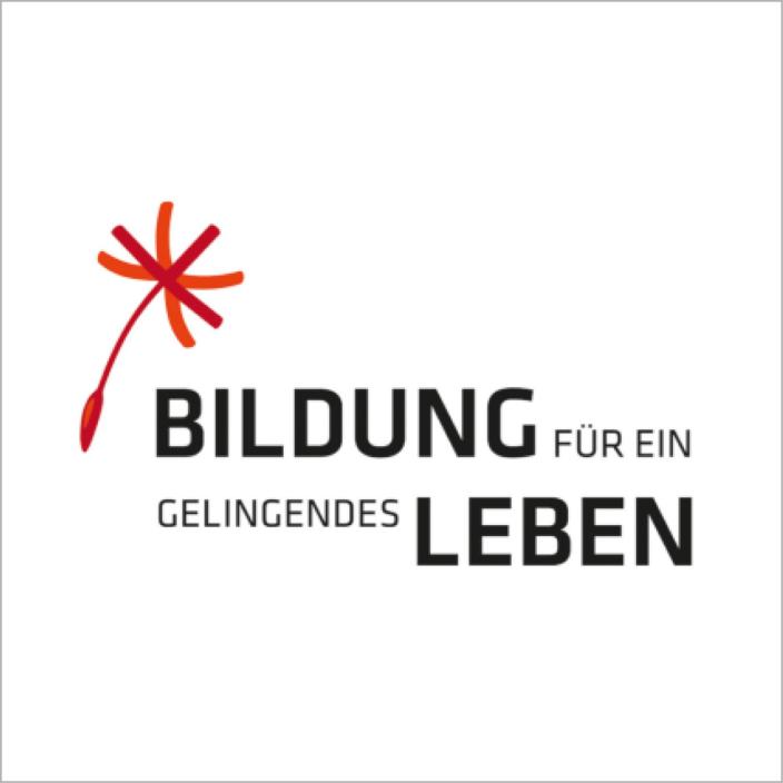 Schwarzer Schriftzug Bildung für ein gelingendes Leben; davor der Samen einer Pusteblume in rot